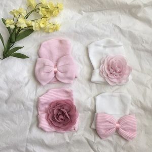 4 newborn girl hats with bows and flowers